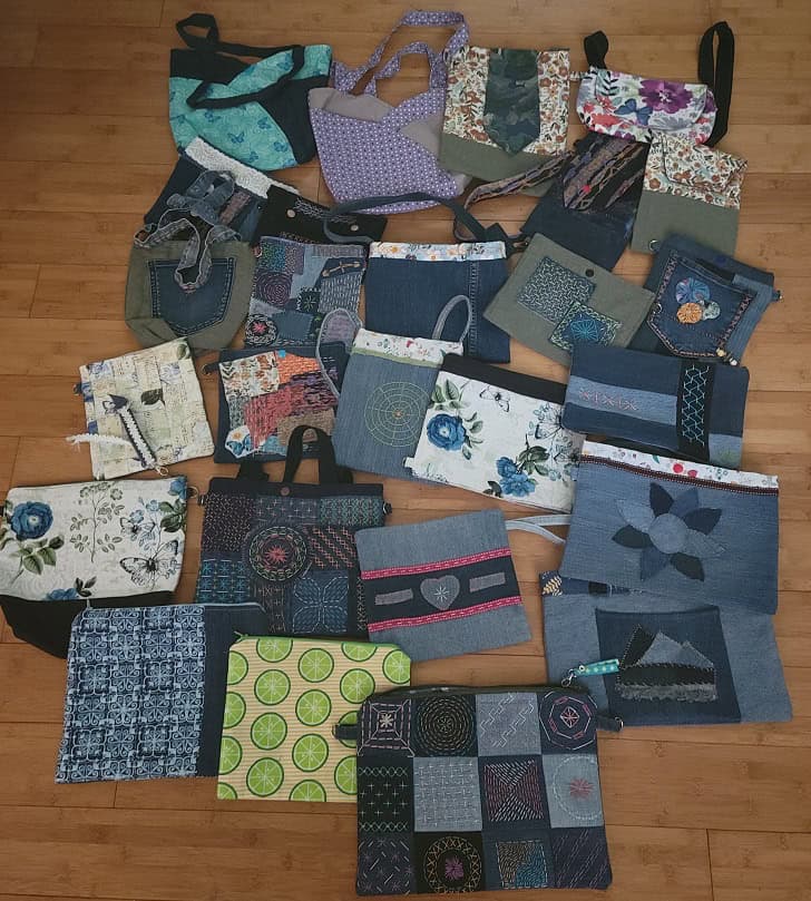 Medium sized bags mostly upcycled jeans with embroidery designs